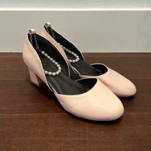 pink barely worn 2 and 1/2 inch block heels with pearl strap